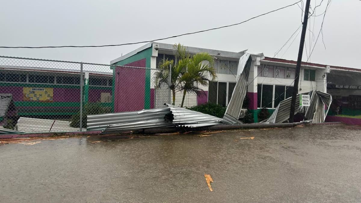 Sheets of zinc littered the William Knibb Memorial High compound after the passage of the Category 5 hurricane.