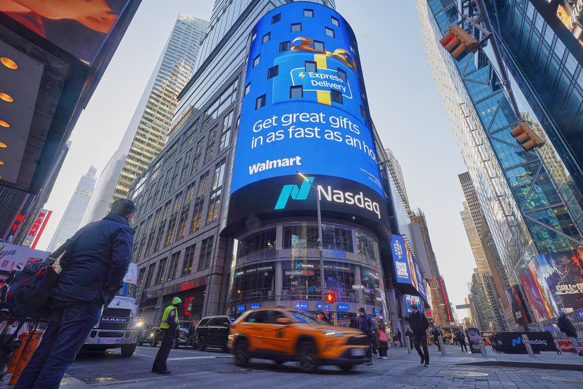 AP
Walmart is displayed on the facade of the Nasdaq MarketSite, in New York, on Tuesday, December 9, 2025. 