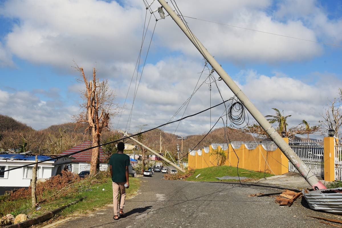 Utility poles partially down in St Elizabeth after the passage of Hurricane Melissa.