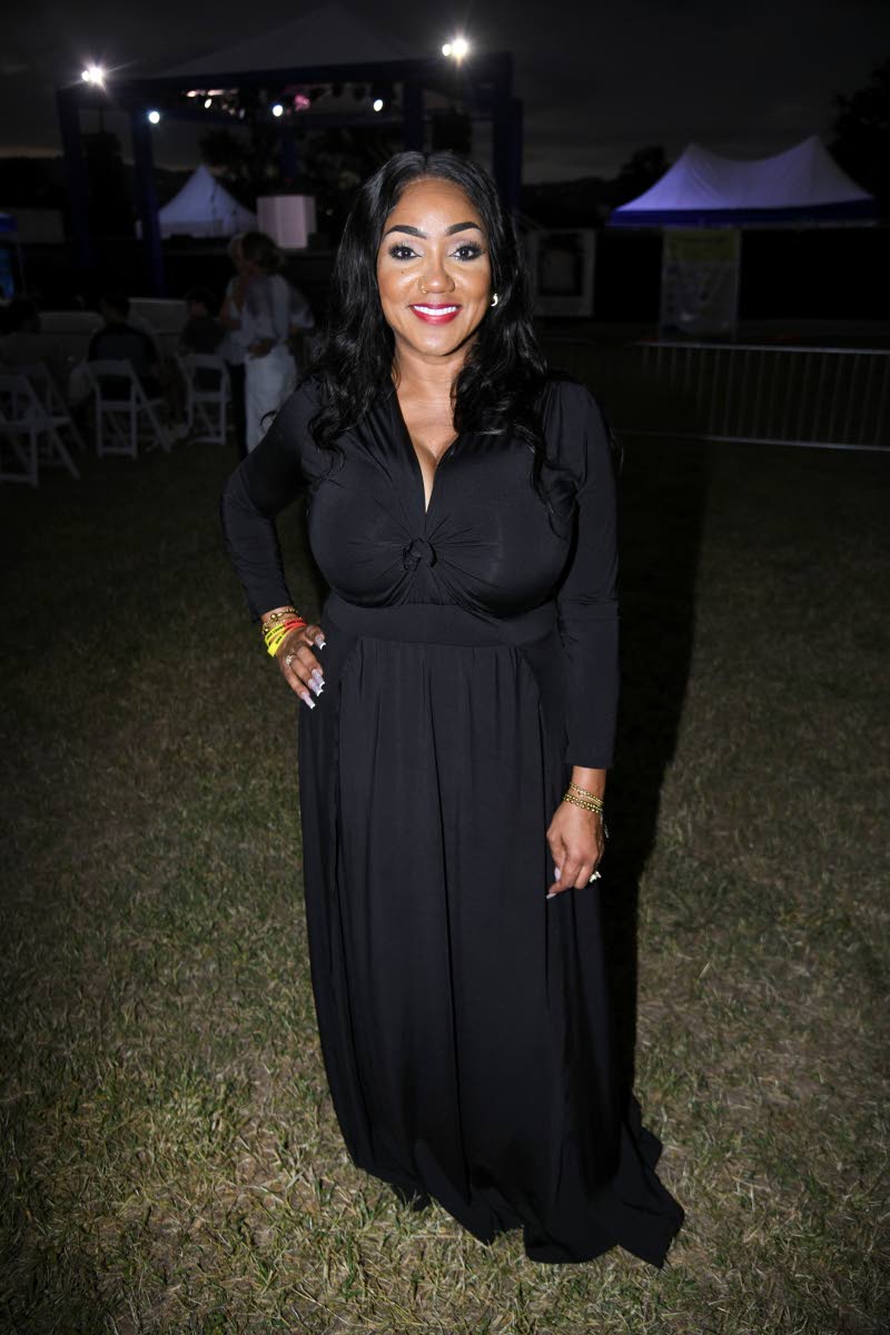 Rocking a black maxi is Heather Cummings, the evening’s host and managing director of RAPATA Productions.