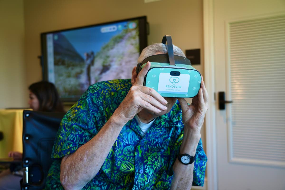 
Bob Rogallo watches video through a Rendever virtual-reality headset at the Forum at Rancho San Antonio retirement community in Cupertino, California, USA. 