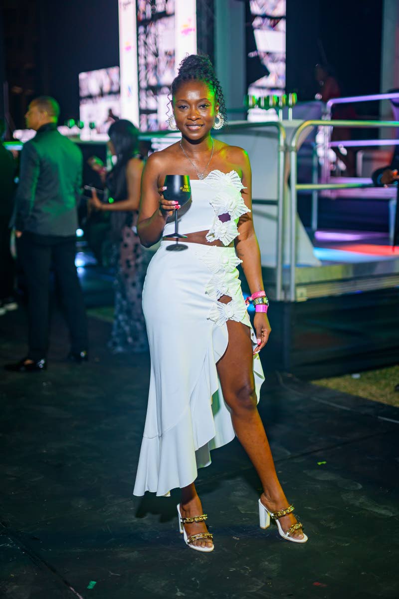 Above: Laurice Griffiths, junior brand manager at Red Stripe, raises her drink to a good time.