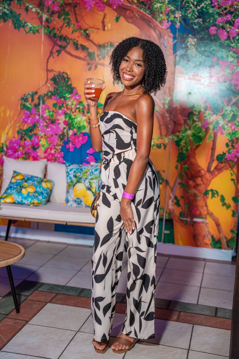 Physiotherapist Jordann Ifill raises her drink to a good time.