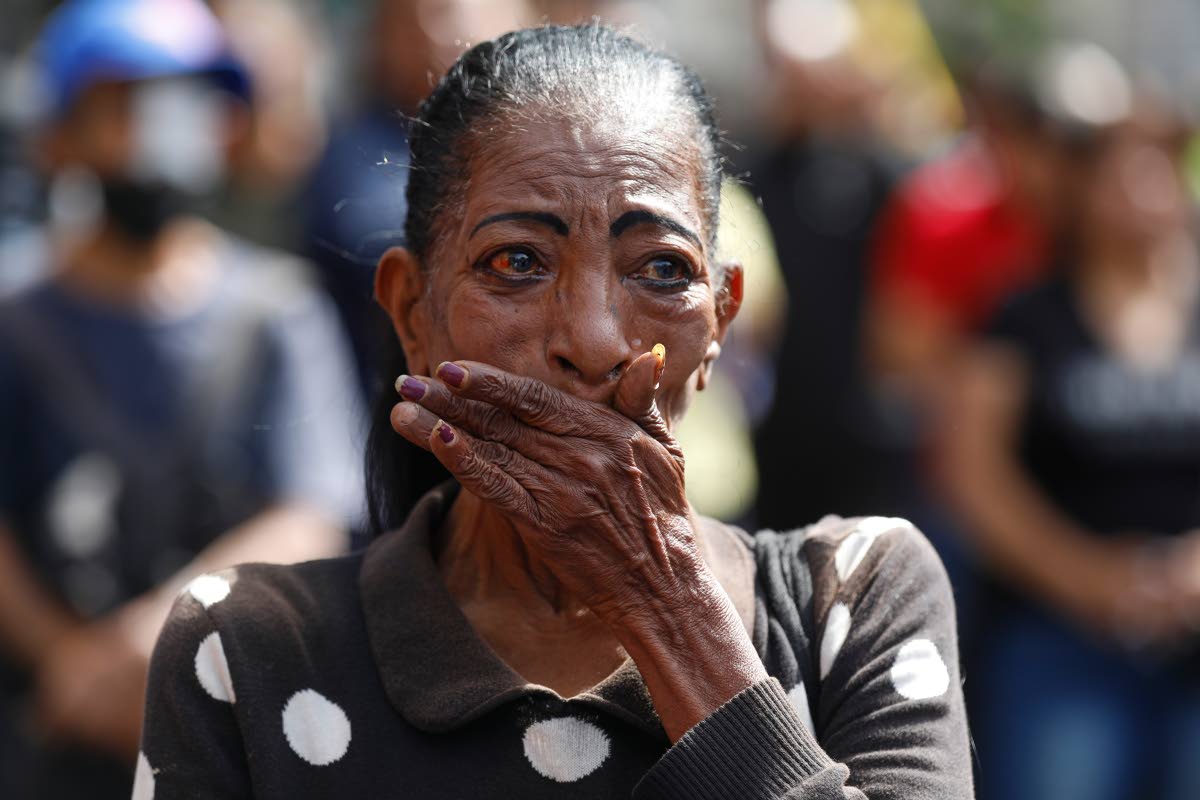 
A woman cries during a rally of supporters of Venezuelan President Nicolás Maduro in Caracas, Venezuela, on Saturday.
