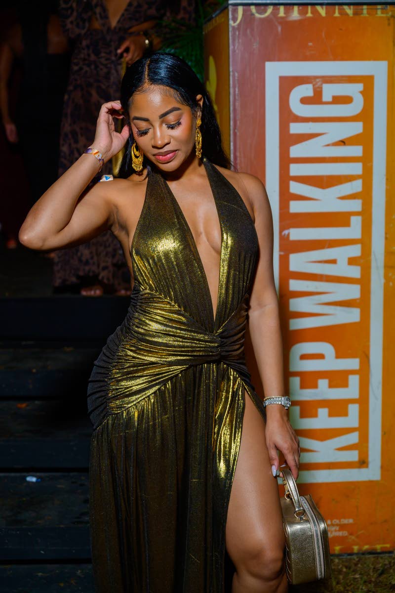 Right: Dentist, Dr Chinel Lee shines at Frenchmen Climax, wearing a plunging gold gown from TK Raffine. 