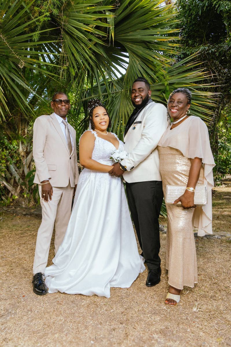 The happy newlyweds are joined by Stefon’s father, Samuel Henry (left), and Stefon’s grandmother, Emmeline Miller Nelson.