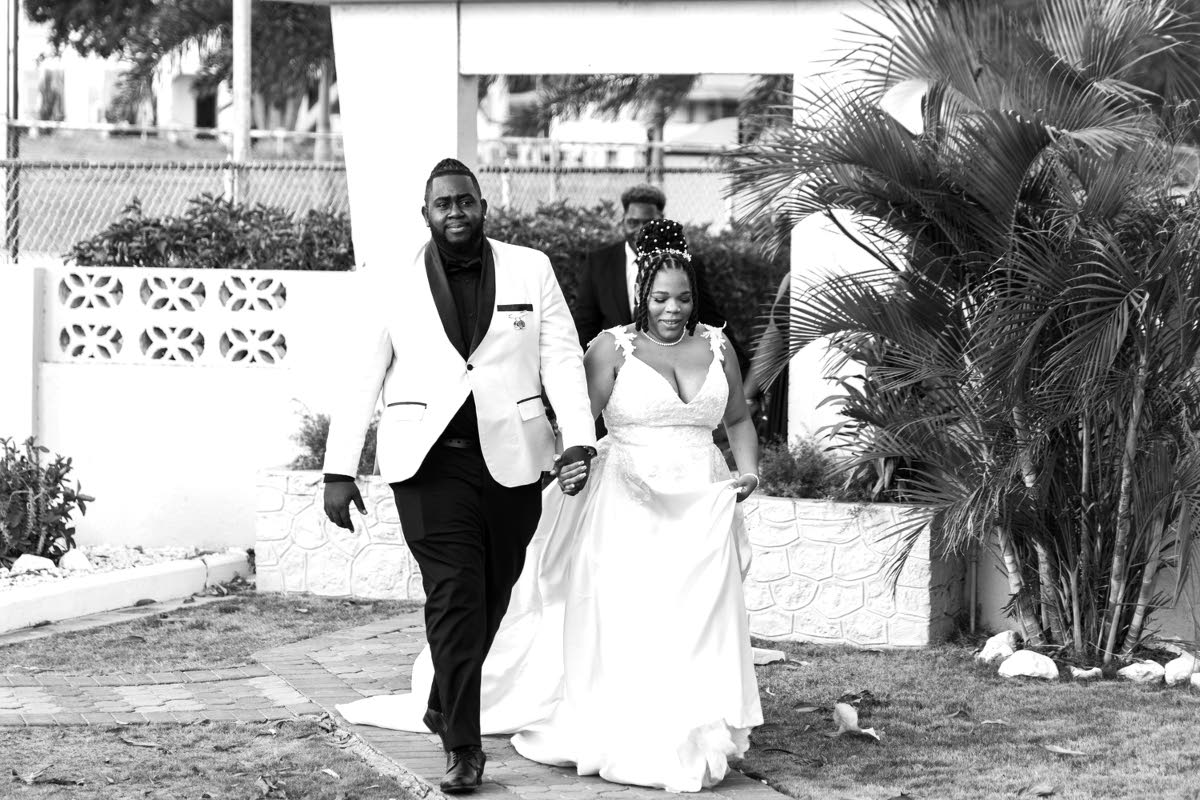 Hand-in-hand, the happy couple walk into a new chapter together. 