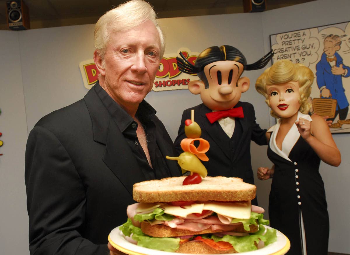 Dean Young shows off one a Dagwood sandwich at his New Orleans, USA-based test kitchen on May 9, 2006. 