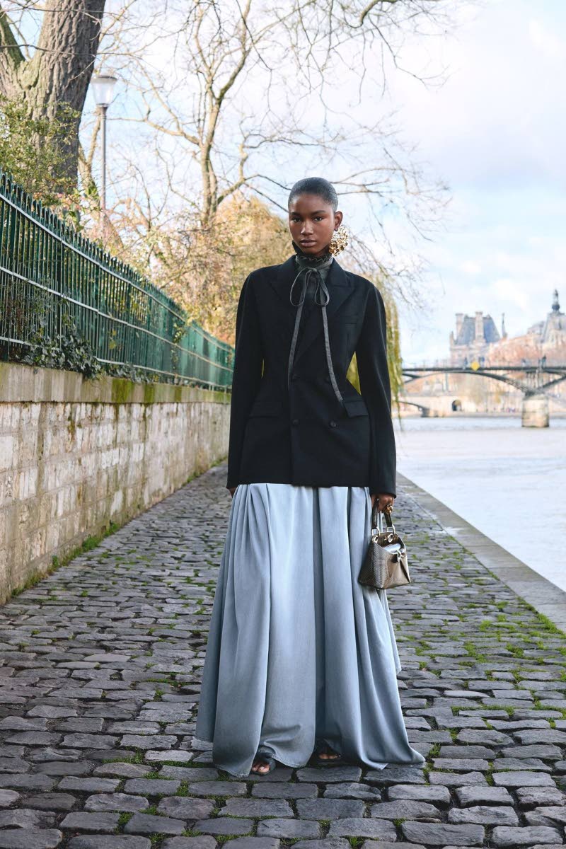 Fashion editor and stylist Benjamin Bruno curated the Dior wardrobe for the Paris-shot lookbook in which Campbell is featured in nine impeccably chic ensembles.