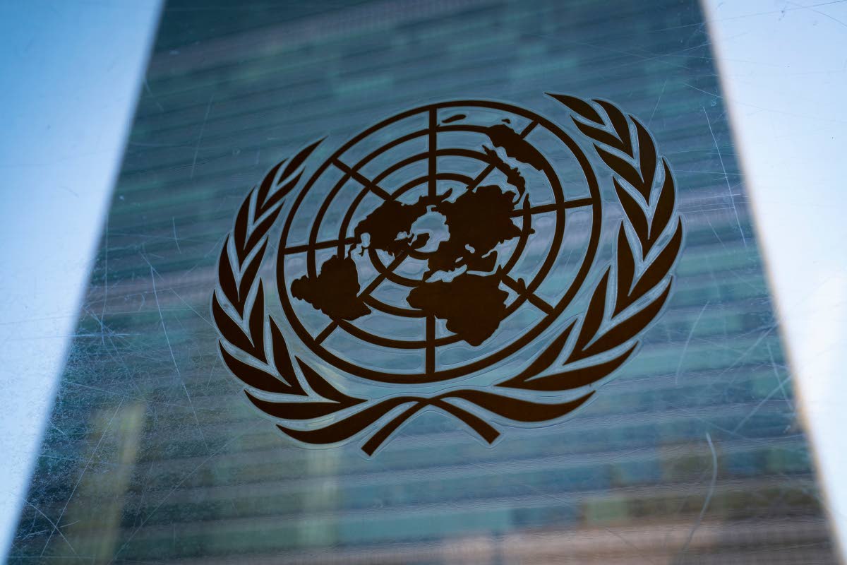 FILE – The symbol of the United Nations is displayed outside the Secretariat Building, February 28, 2022, at United Nations Headquarters. 
