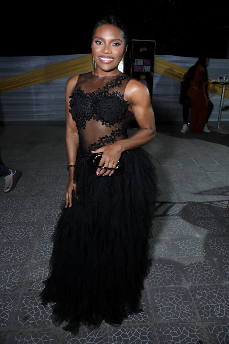 Bodybuilder, Bryana Johnson, goes Style Savvy in this sheer black dress.
