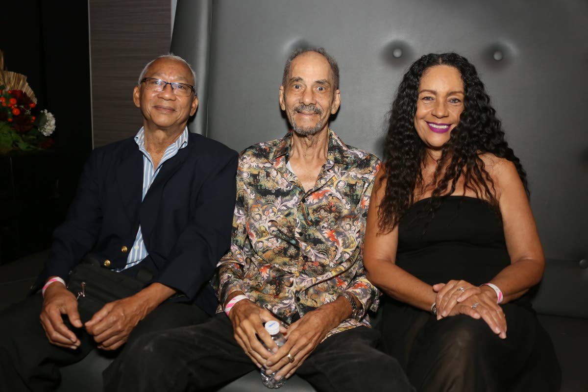 Soaking up the evening’s launch are Frankie Campbell (centre), flanked by Peter Ashbourne (left) and Dorett Fielding.