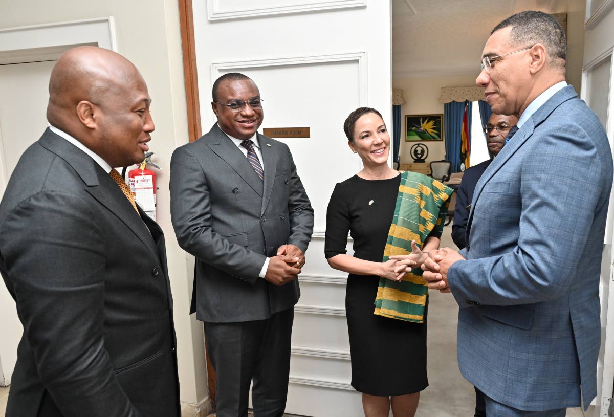 Prime Minister Dr Andrew Holness and Senator Kamina Johnson Smith, minister of foreign affairs and foreign trade, speak with Samuel Okudzeto Ablakwa (left), minister of foreign affairs of the Republic of Ghana, and his Ghana Deputy Minister/ Ministry of De