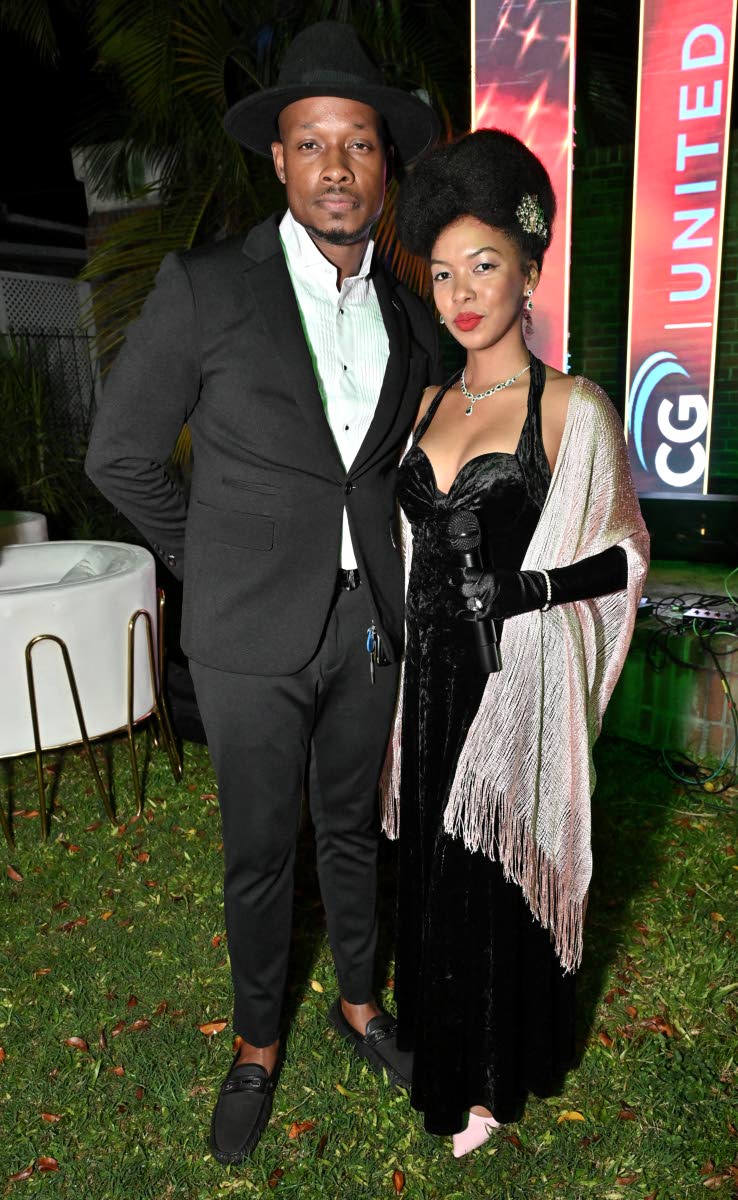 Below: Just moments before delighting guests with an unforgettable live performance, saxophonist Verlando Small and singer Zhayna France pause for our lens.