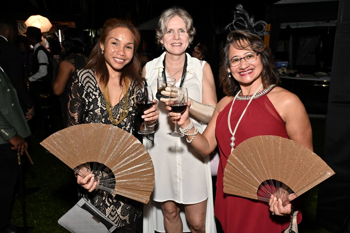 From left: Tracy Lee, Joanne Fletcher-Sale and Simone Fong Kong, raise a toast to the evening.