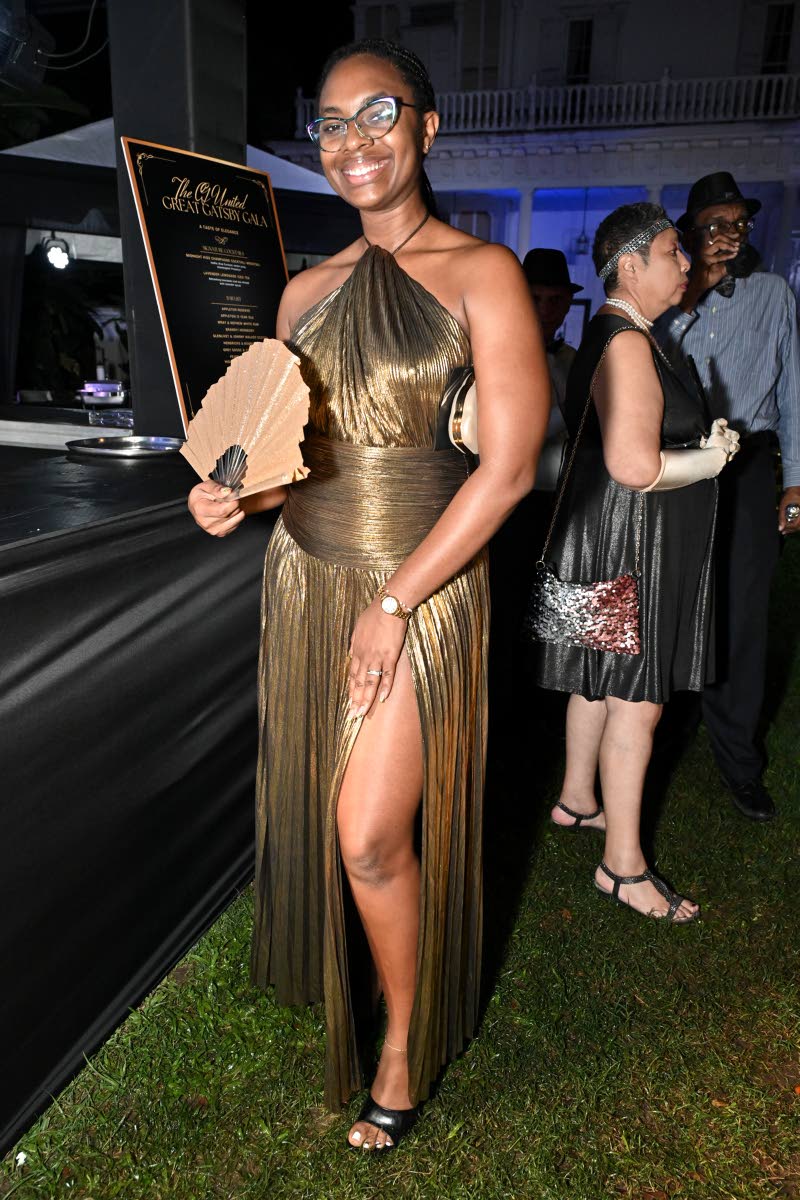 Below: Attorney-at-law Ashley Campbell’s choice of dress is a fashion do in our books.