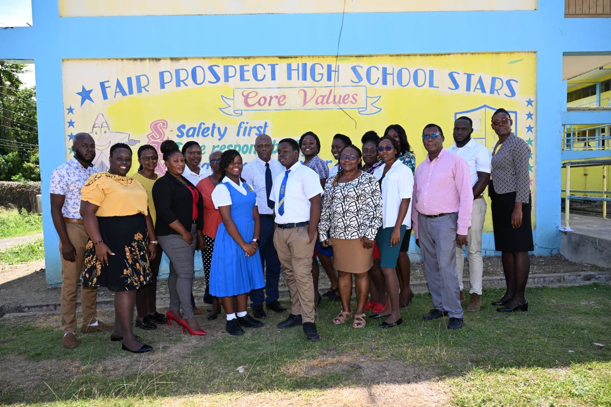 Staff and students at the Fair Prospect High School in Portland pose for a photo. 