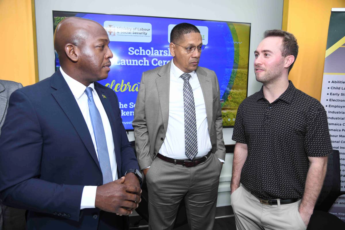From left: Pearnel Charles Jr, minister of labour and social Security; Donovan Williams, state minister in the Ministry of Labour and Social Security; and Benjamin Murray, communications adviser at Ontario Fruit and Vegetable Growers’ Association; in dia