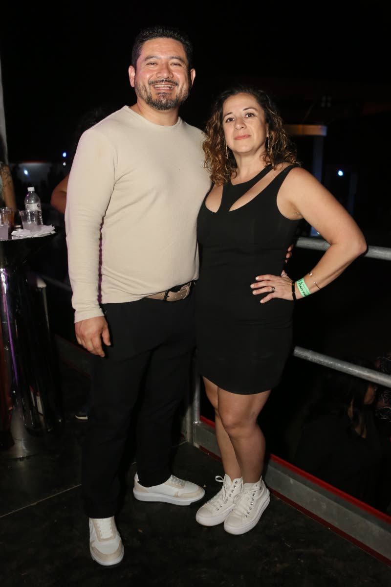 CEO of  Kingston Freeport Terminal Limited Carlos Cabrera, and his wife, Rita, soak up the night’s festivities.