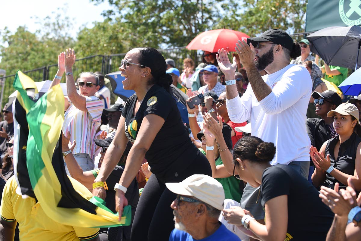 Photos by Ian Allen/Photographer 
Fans in the stands supporting Jamaica in their Davis Cup Group II tie against Uruguay at the Liguanea Club in New Kingston yesterday. 