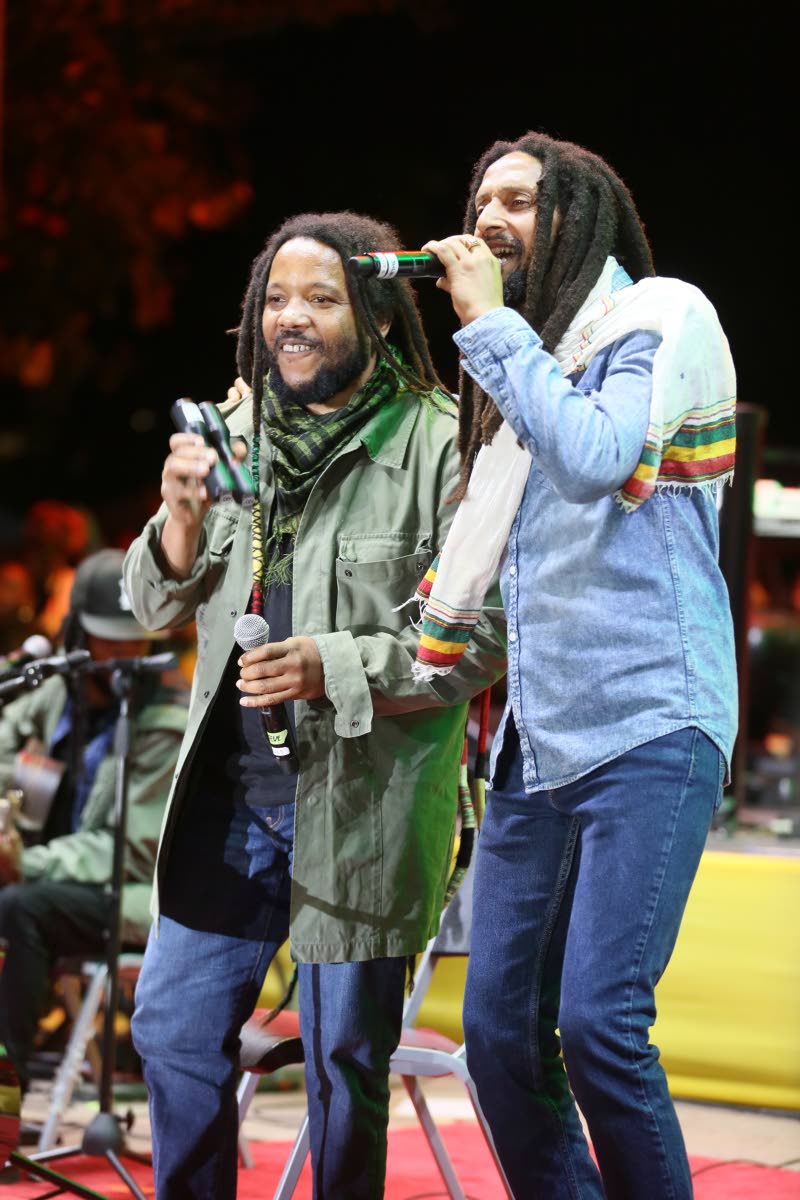 Brothers Stephen (left) and Julian Marley celebrate their father’s birthday on February 6 at Emancipation Park in New Kingston.