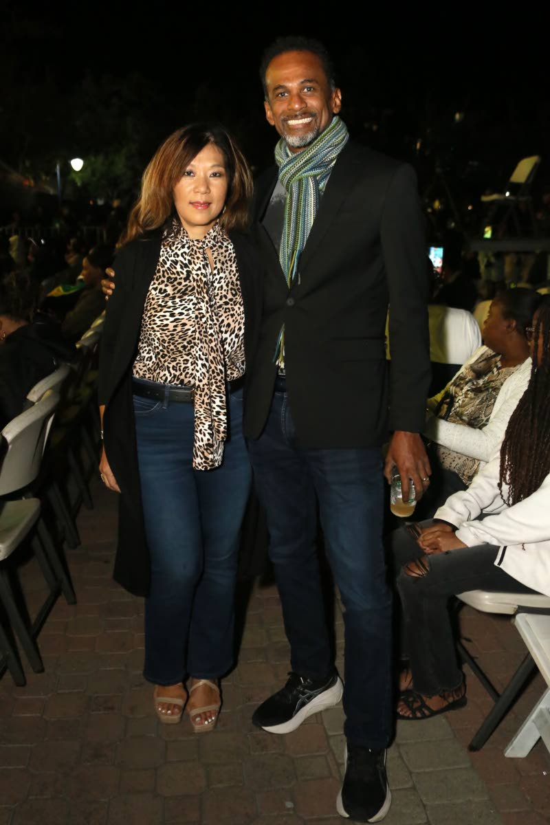 Dr Carey Wallace, executive director of the Tourism Enhancement Fund, and his wife Vivene, brave the cool evening air, soaking up the concert’s vibe.