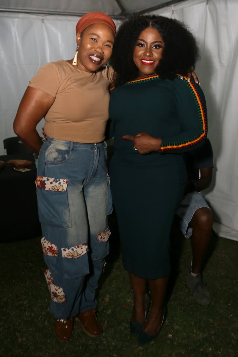 Above: Queen Ifrica (left) and Etana share a smile backstage during the celebrations.