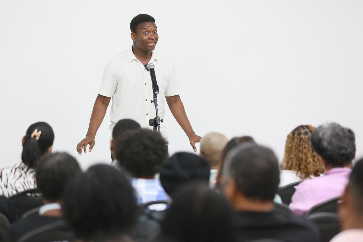 Jamar Grant delivers his winning story, ‘In Search of More-Rock’, during the fifth annual What’s Your Story, Jamaica? storytelling competition.