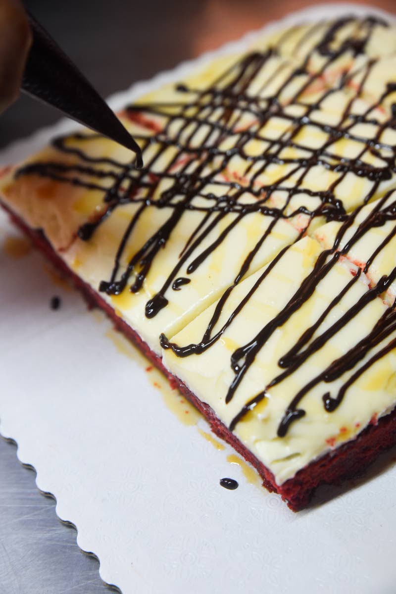 Hershey’s chocolate drizzle atop the Baileys red velvet blondie. 
