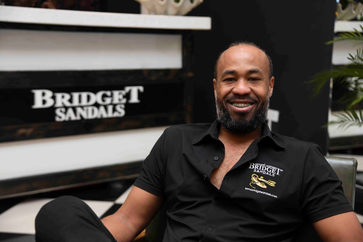  Jonathan Buchanan, board member of the Black Angel Foundation, in a recent interview at Bridget Sandals on Hope Road in St. Andrew.