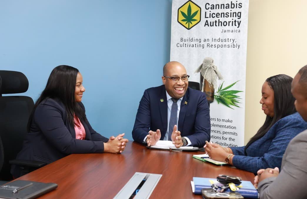 Delano Seiveright, minister of state in the Ministry of Industry, Investment and Commerce, is joined by Cannabis Licensing Authority Chief Executive Officer Farrah Blake (left) and Simoy Brown, director of public relations and communications at the CLA, du