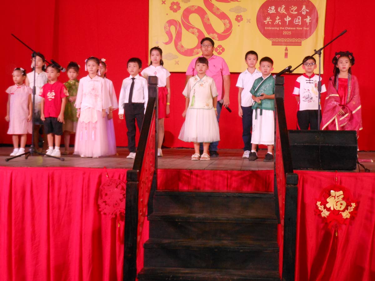 Children onstage at the CBA Centre performing in Chinese New Year concert.