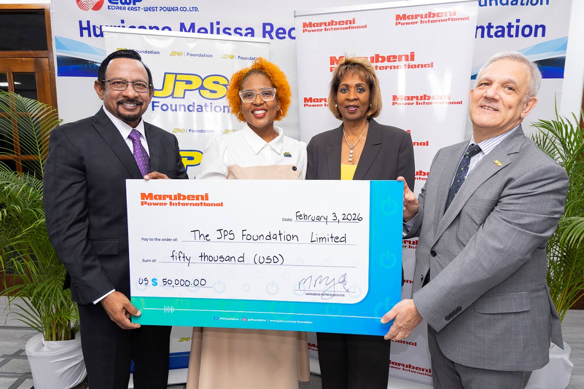 Charmaine Heslop-DaCosta (second right), senior vice president, People Operations, Jamaica Public Service (JPS), and Sophia Lewis (second left), Head, JPS Foundation, share a moment with Mo Majeed(left), chief operating officer, Marubeni Power Internationa