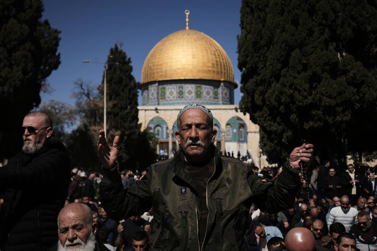 Muslim worshippers offer prayer on the first Friday of the holy month of Ramadan at the Al-Aqsa Mosque compound in Jerusalem’s Old City, Friday, February 20.