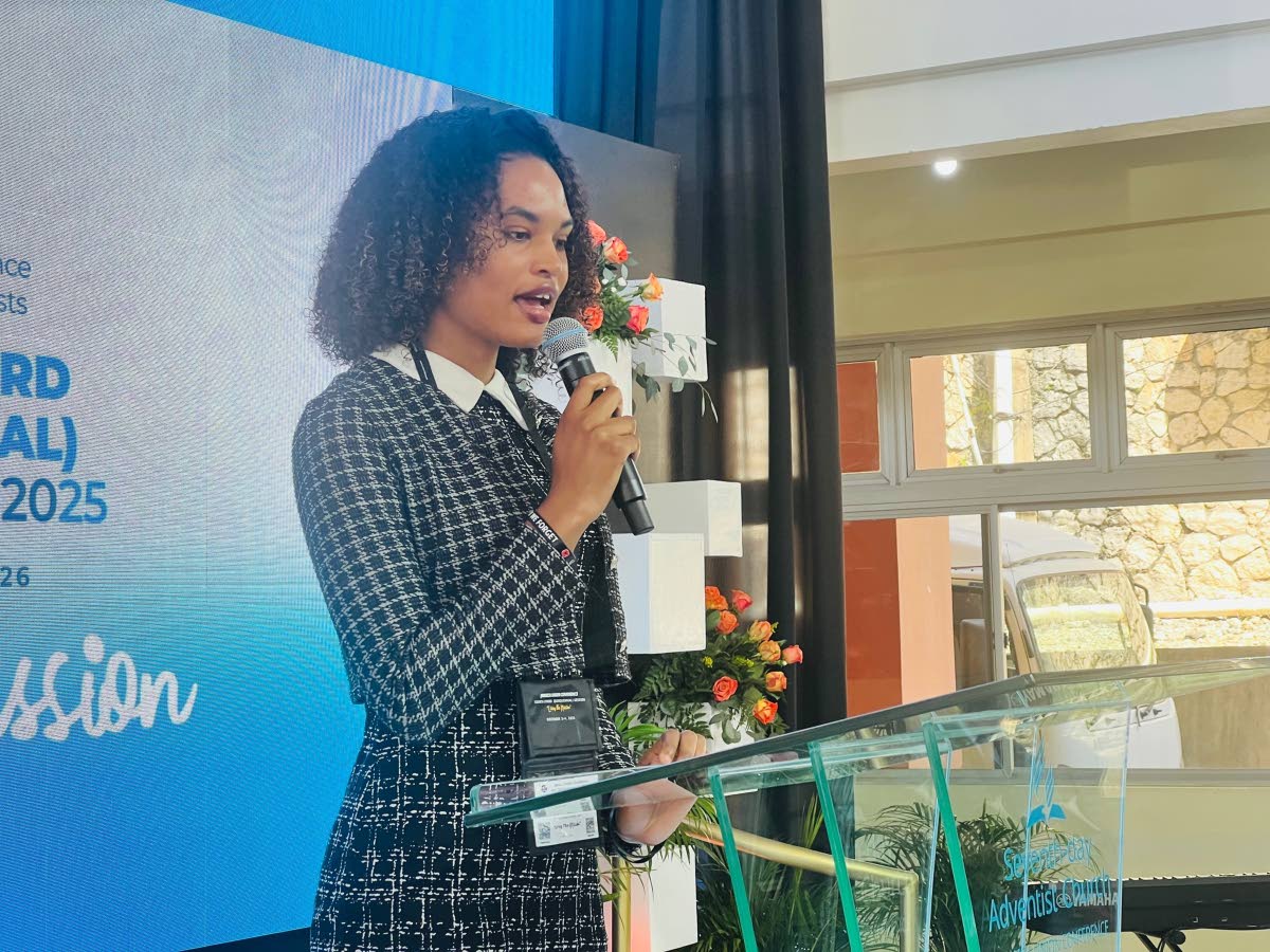 Gabrielle Morrison reads the scripture from the podium during the opening ceremony.