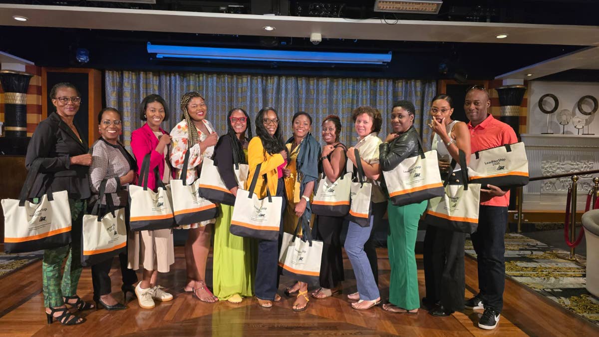 Participants of the recent “Find Your Why” workshop inside the Olive or Twist Lounge aboard Liberty of the Seas.  