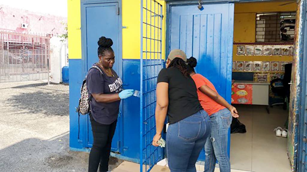PWD Co-operative Credit Union team members in action, painting the exterior of Bethany Early Childhood Development Centre on December 30, 2025, following the credit union’s adoption of the school.