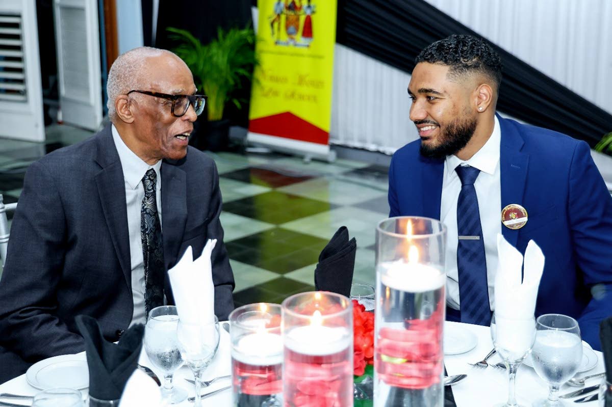 Justice Hugh Small, KC, shares a moment with mentee Anil Naton during the pilot of the Norman Manley Law School Dining and Mentorship Programme at Mary Seacole Hall of The University of the West Indies, Mona Campus, on February 21.