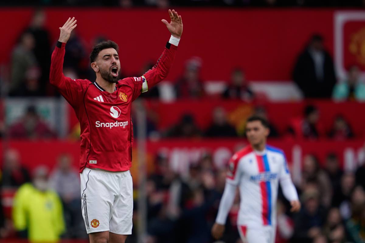 Manchester United's Bruno Fernandes celebrates after scoring during the Premiier League football match between Manchester United and Crystal Palace in Manchester, England on March 1, 2026. (AP Photo/Dave Thompson)