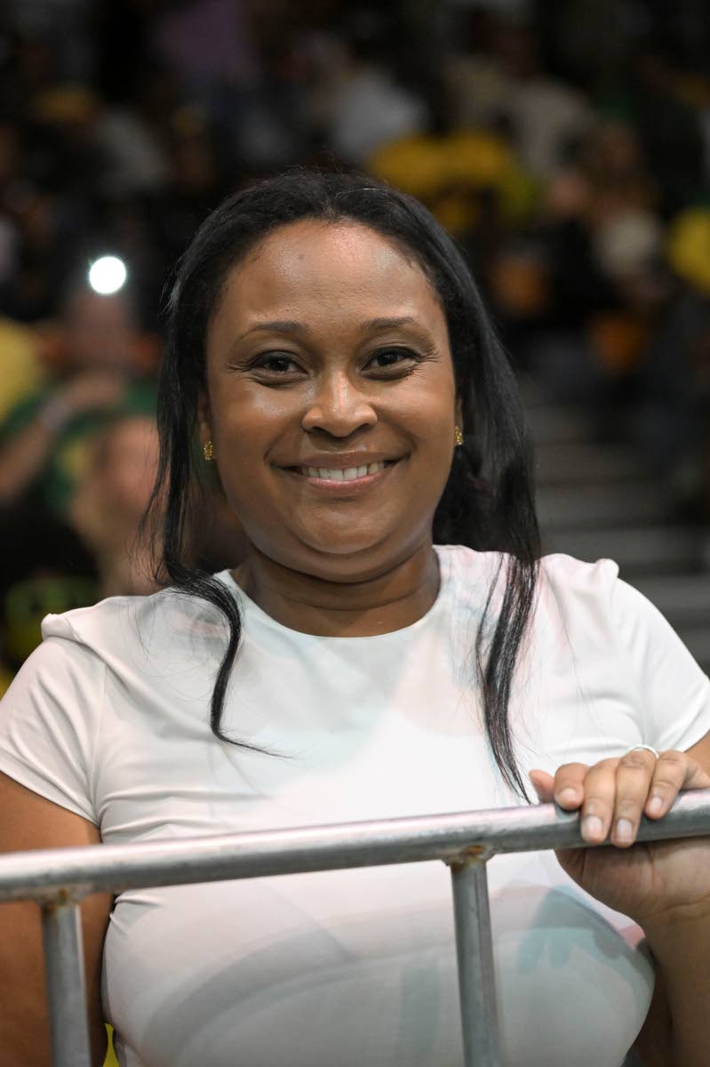 JamRockerz shooting guard Chase Audige gets the support of his sister, Jody Ashton, during a FIBA World Cup basketball match against Canada at the National Indoor Sports Centre on Sunday.