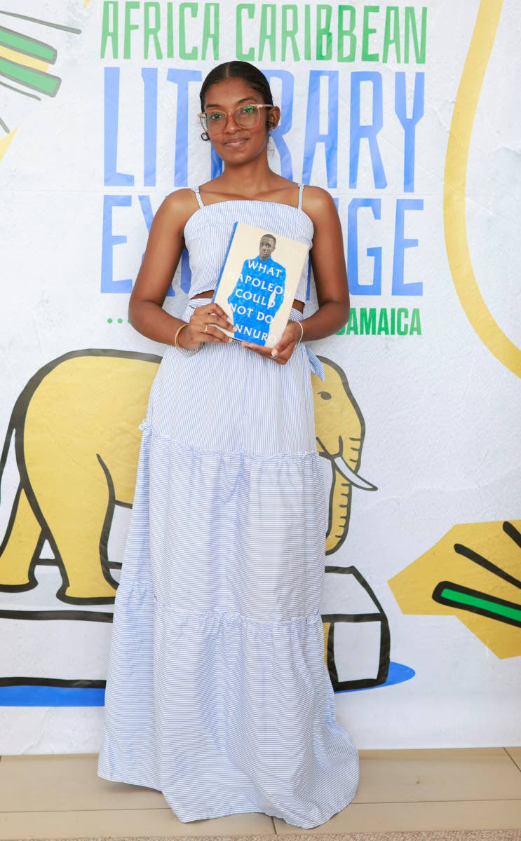 Rianne Garvin, a university student, shows off her current read during the literary exchange. 