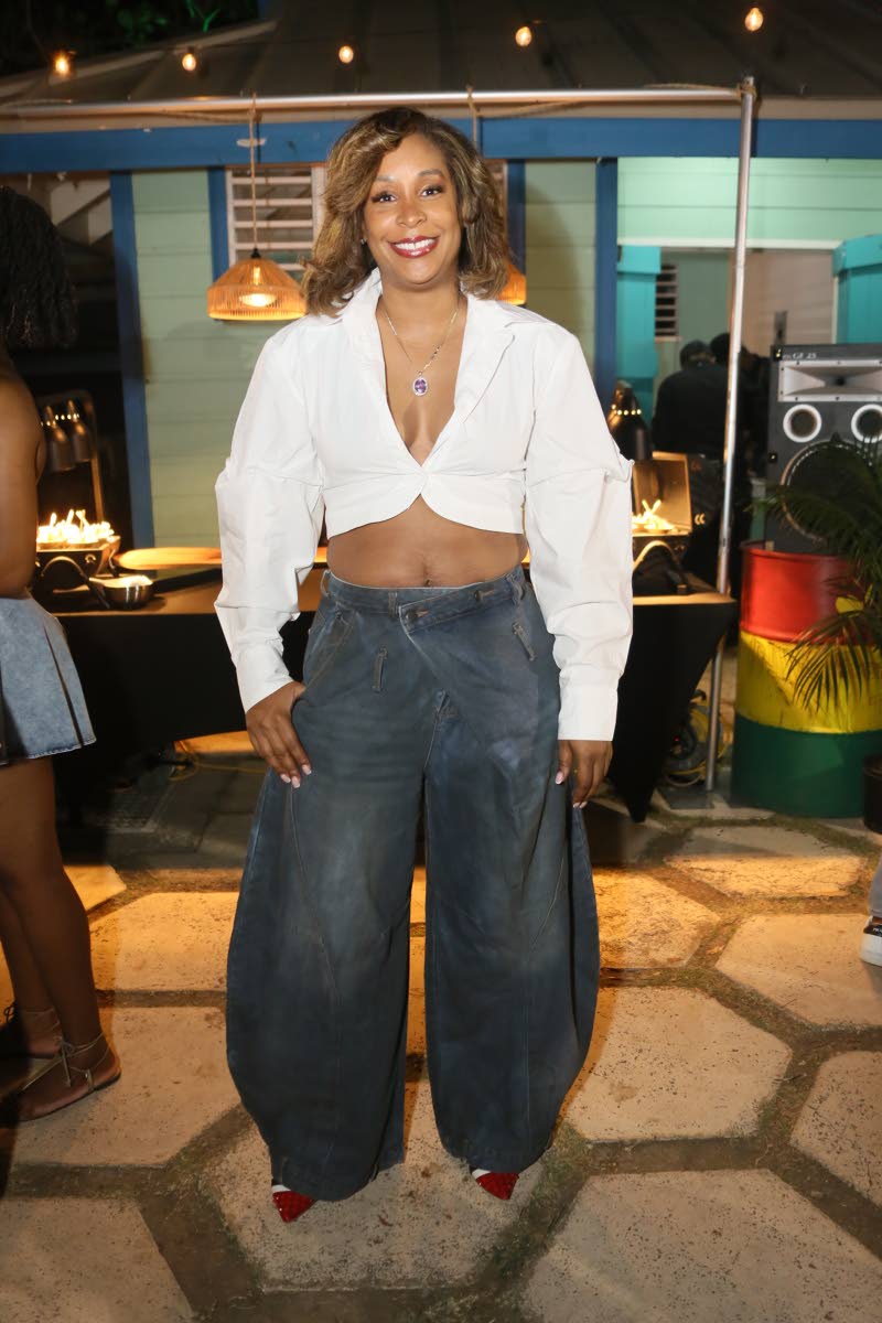 Shani Duncan-Falconer, senior corporate manager at JMMB, arrives at Kuyah in an eye-catching Fitz Clothing number.