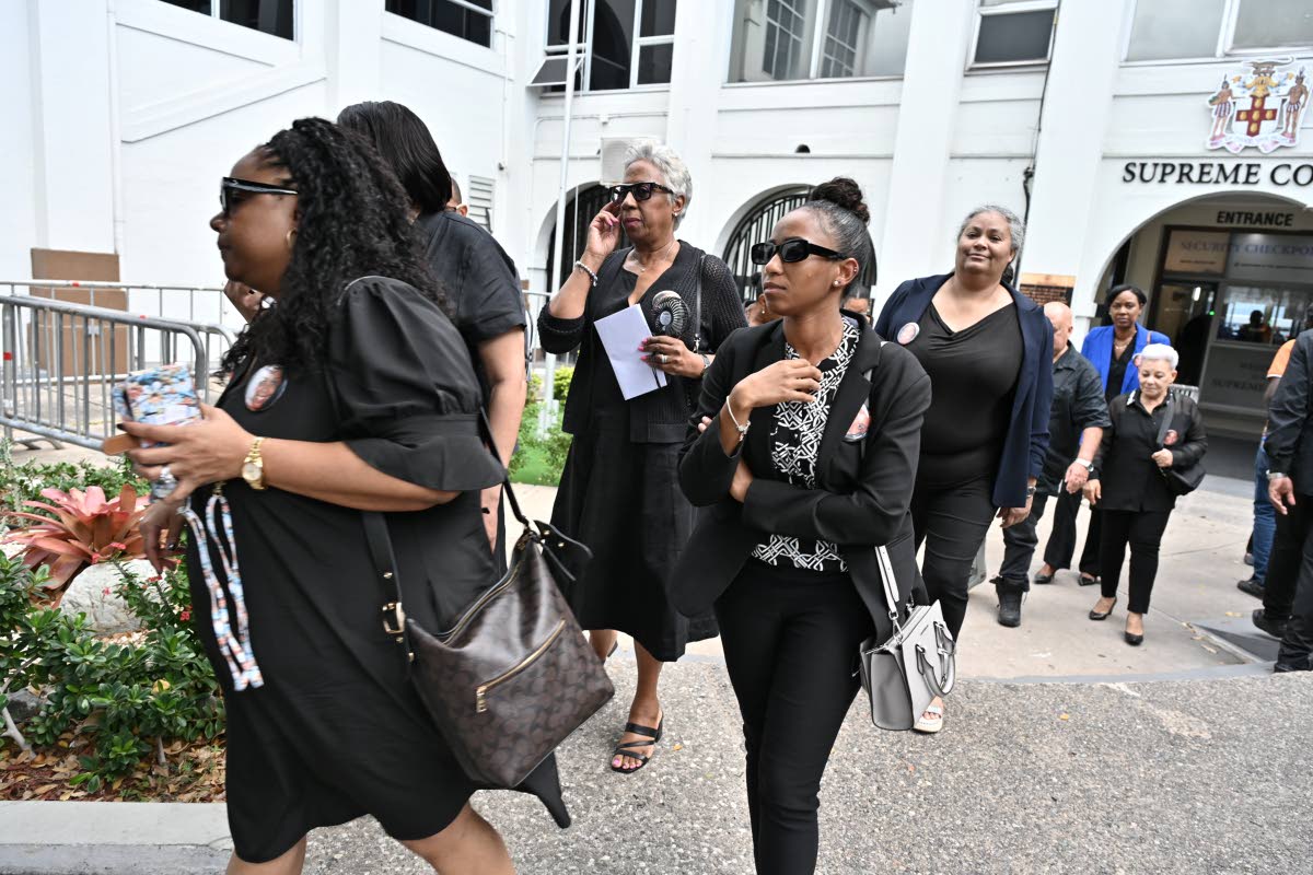Family members and friends of Melissa Silvera leave the Supreme Court after the sentencing of Jolyan Silvera at the Supreme Court in downtown Kingston yesterday. 