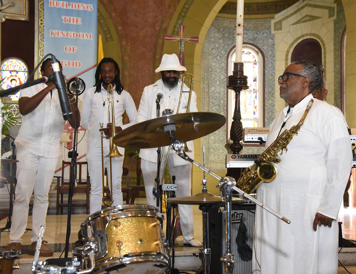 Dean Fraser (right) and bandmates.