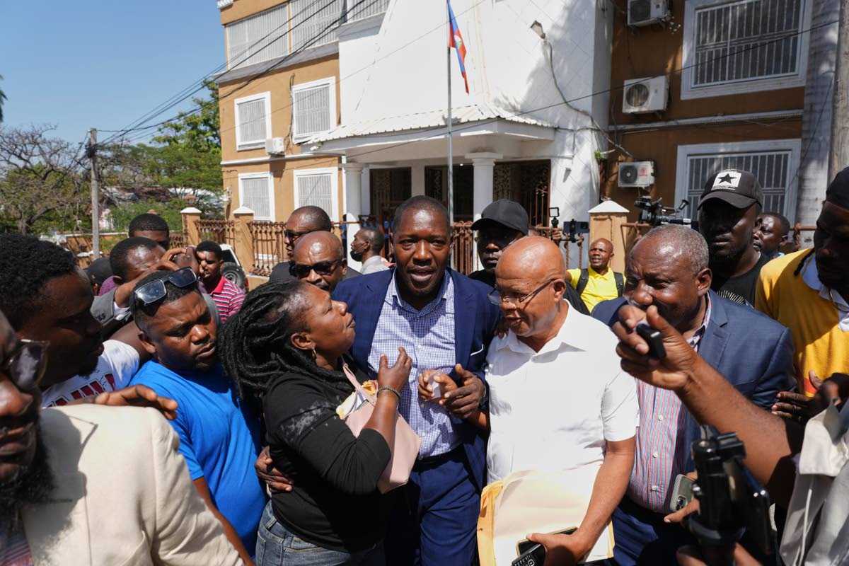 Former deputy Abel Decollines leaves after registering his political party, Collective of Actors for Development and Alternative Organization, at the Provisional Electoral Council in the Petion-Ville neighborhood of Port-au-Prince, Haiti on March 12, 2026.