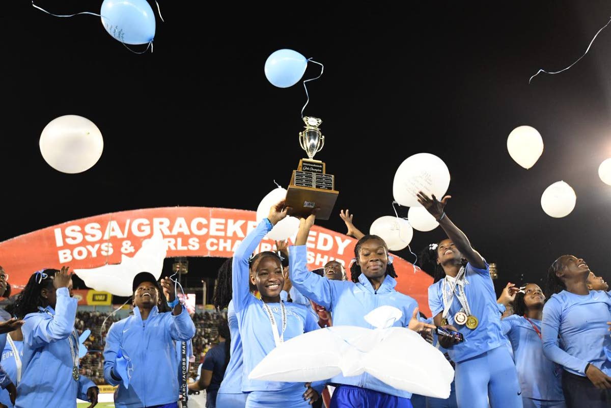 Edwin Allen Athletes celebrate winning the 2026 ISSA/GraceKennedy Boys and Girls’ Athletics Championships inside the National Stadium yesterday. 