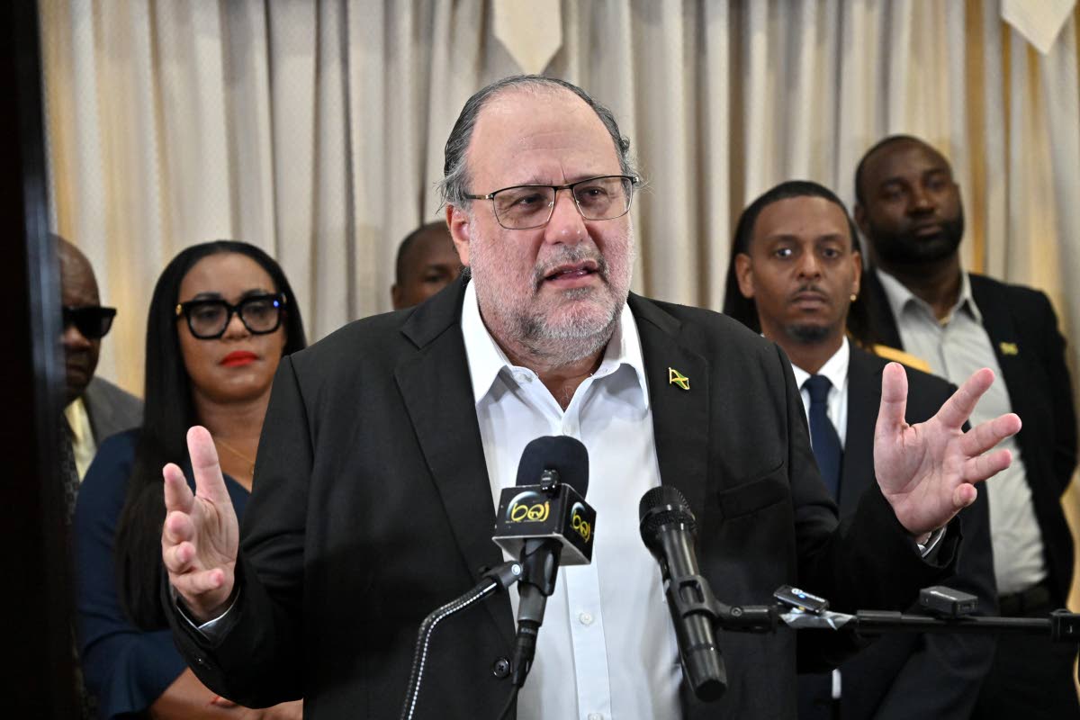 Opposition Leader Mark Golding speaks at the PNP press conference.