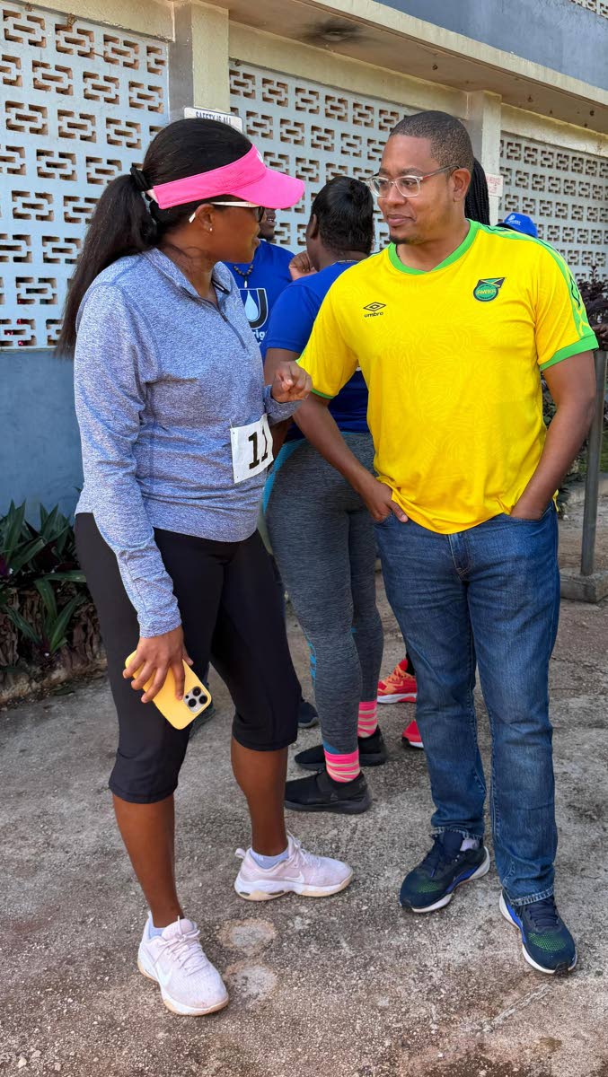 Board Chair Trisha Williams-Singh and Floyd Green, member of parliament for St Elizabeth South Western. 