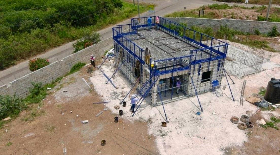 This aerial photo shows a housing unit under construction