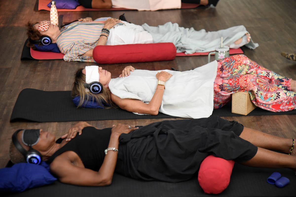 Participants are guided through a 9D Breathwork session at Yahsuh Fitbox in St Andrew on Saturday.